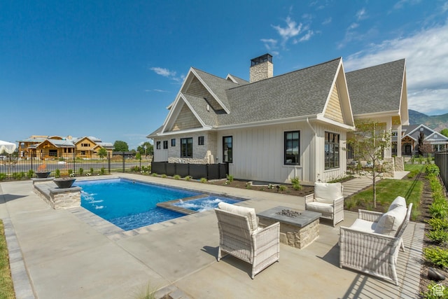 423 S 150 E, Mapleton, UT 84664 - view of swimming pool with an outdoor living space with a fire pit, a patio area, a fenced backyard, and a pool with connected hot tub