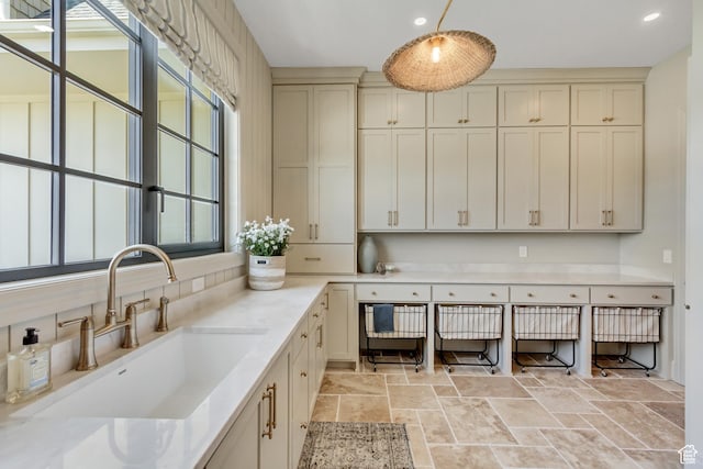 423 S 150 E, Mapleton, UT 84664 - kitchen with stone tile flooring, light countertops, recessed lighting, and cream cabinetry