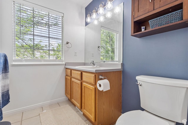 3709 S Angelico Ct Unit D, West Valley City, UT 84119 - bathroom featuring tile patterned flooring, vanity, toilet, and baseboards