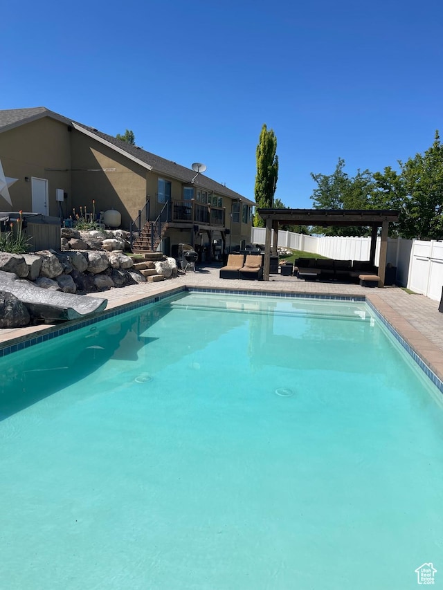 5617 W High Spirit Ct, Herriman, UT 84096 - view of pool with stairs, a fenced backyard, and a patio area