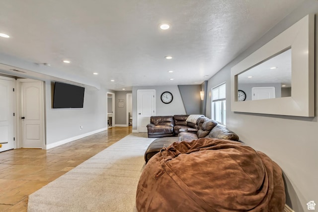 5617 W High Spirit Ct, Herriman, UT 84096 - living area with stone tile floors and recessed lighting