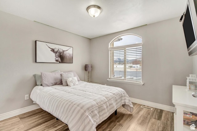5617 W High Spirit Ct, Herriman, UT 84096 - bedroom with wood finished floors