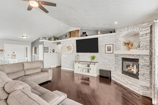 5617 W High Spirit Ct, Herriman, UT 84096 - living area featuring a fireplace, lofted ceiling, ceiling fan, and wood finished floors