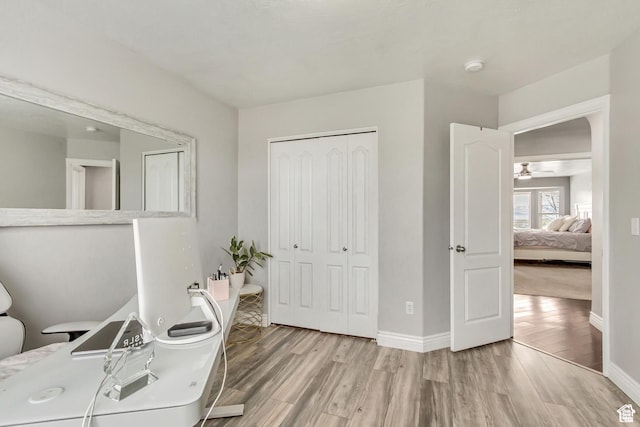5617 W High Spirit Ct, Herriman, UT 84096 - office space featuring wood finished floors and a ceiling fan