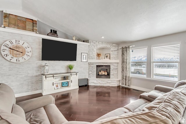 5617 W High Spirit Ct, Herriman, UT 84096 - living room featuring a stone fireplace and wood finished floors