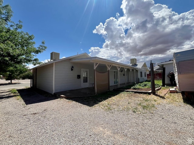 766 Huntridge Dr, Moab, UT 84532 - rear view of house with central AC unit