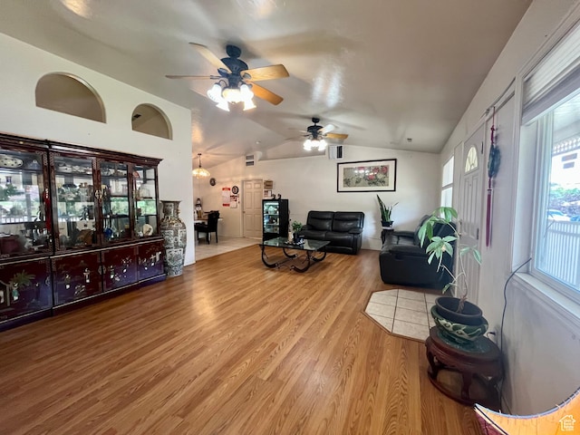 766 Huntridge Dr, Moab, UT 84532 - living room with vaulted ceiling, wood finished floors, and ceiling fan