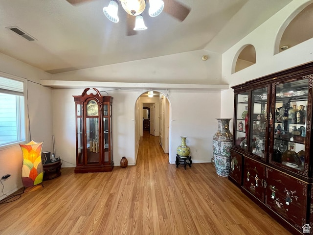 766 Huntridge Dr, Moab, UT 84532 - interior space featuring arched walkways, ceiling fan, wood finished floors, and lofted ceiling