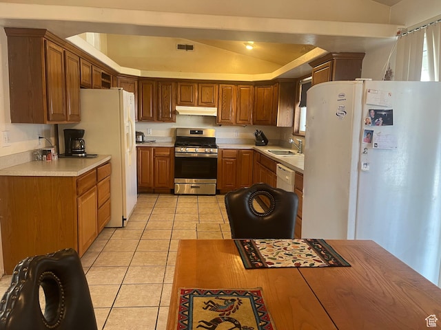 766 Huntridge Dr, Moab, UT 84532 - kitchen with white appliances, under cabinet range hood, a sink, light tile patterned floors, and light countertops