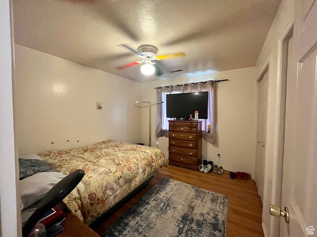 766 Huntridge Dr, Moab, UT 84532 - bedroom with wood finished floors and a ceiling fan