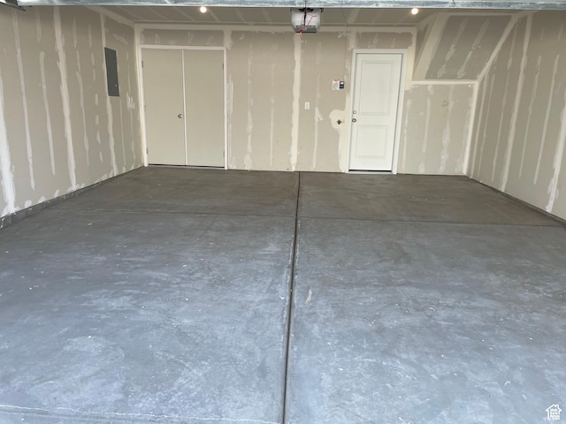 1650 N Main St N Unit 126, Layton, UT 84041 - garage featuring electric panel and a garage door opener