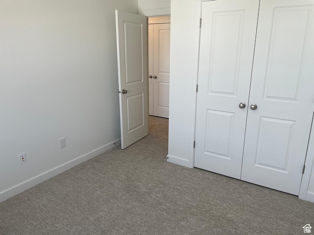 1650 N Main St N Unit 126, Layton, UT 84041 - unfurnished bedroom with carpet floors and baseboards