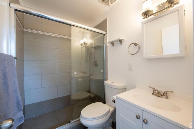 1779 E Ramona Ave S, Salt Lake City, UT 84108 - bathroom with toilet, a stall shower, and vanity