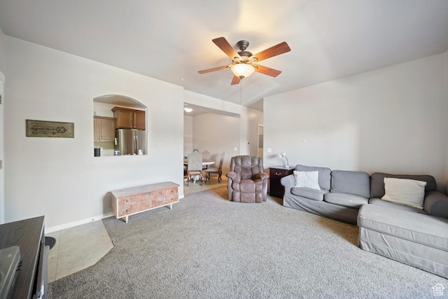 107 E Jordan Blvd Unit 506, Saratoga Springs, UT 84045 - living room featuring ceiling fan, carpet, and arched walkways