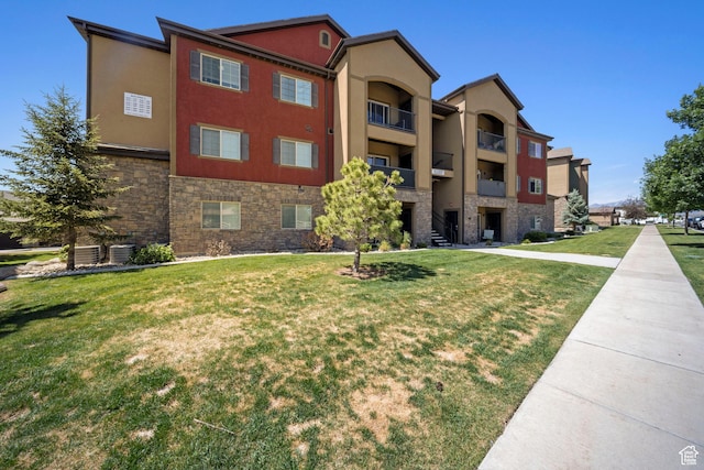 107 E Jordan Blvd Unit 506, Saratoga Springs, UT 84045 - view of building exterior featuring central air condition unit