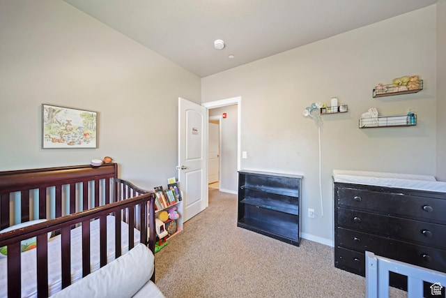 107 E Jordan Blvd Unit 506, Saratoga Springs, UT 84045 - carpeted bedroom featuring baseboards and a nursery area