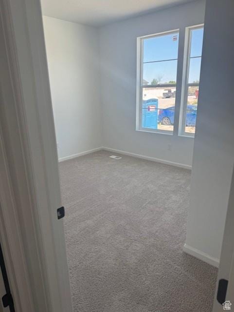 4063 W 2025 S Unit 39, Taylor, UT 84401 - carpeted spare room featuring baseboards