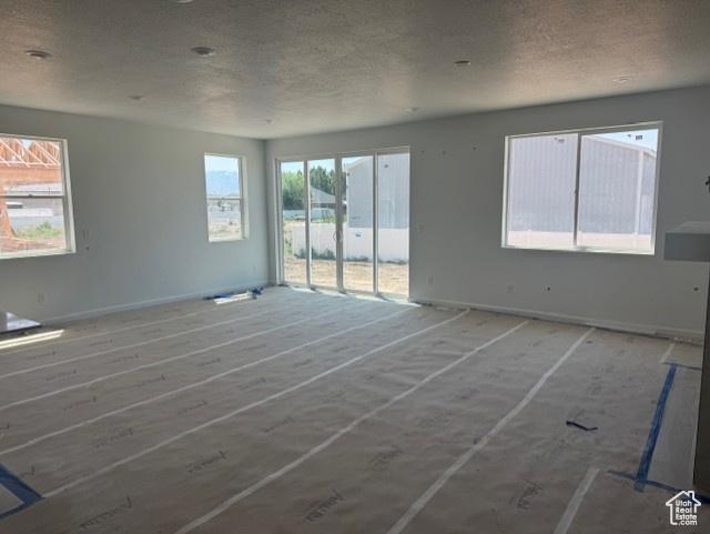 4063 W 2025 S Unit 39, Taylor, UT 84401 - spare room featuring baseboards
