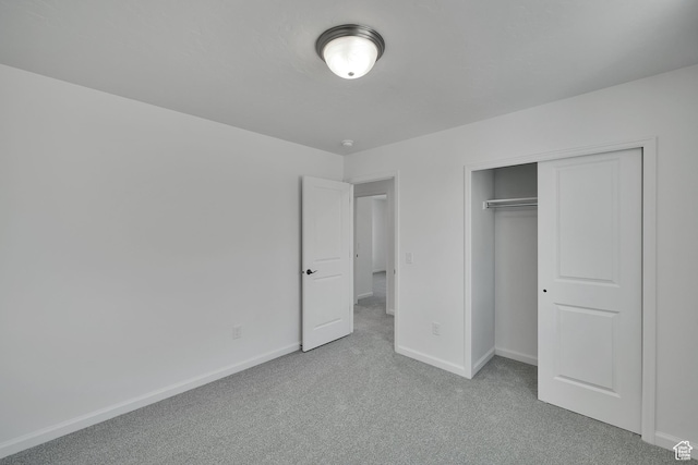 1972 E Burger St Unit 1236, Lake Point, UT 84074 - unfurnished bedroom featuring carpet, baseboards, and a closet