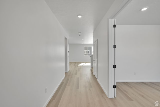 1972 E Burger St Unit 1236, Lake Point, UT 84074 - hallway with light wood finished floors, baseboards, and recessed lighting