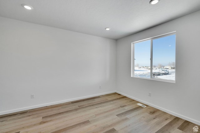 1972 E Burger St Unit 1236, Lake Point, UT 84074 - unfurnished room featuring light wood-style floors, baseboards, and recessed lighting