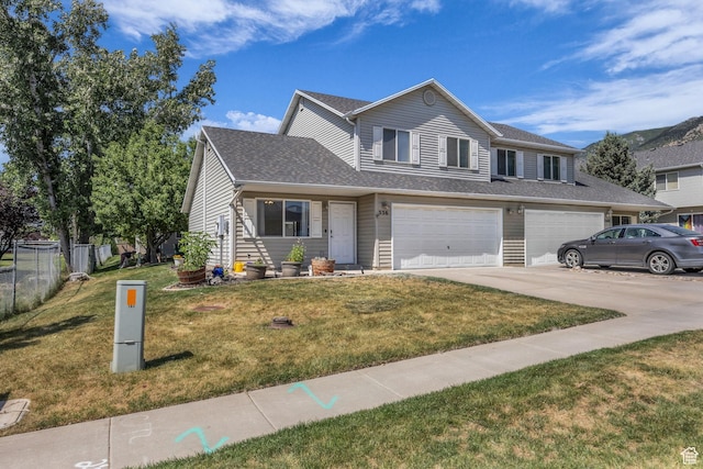 556 E 800 N, Ogden, UT 84404 - view of front of property with concrete driveway, an attached garage, and a shingled roof