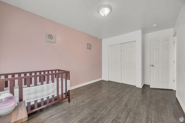 556 E 800 N, Ogden, UT 84404 - unfurnished bedroom with wood finished floors, a closet, and baseboards