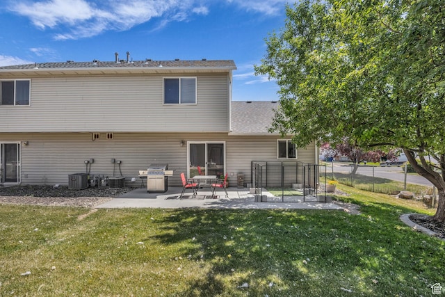 556 E 800 N, Ogden, UT 84404 - rear view of house featuring a patio, cooling unit, and a shingled roof