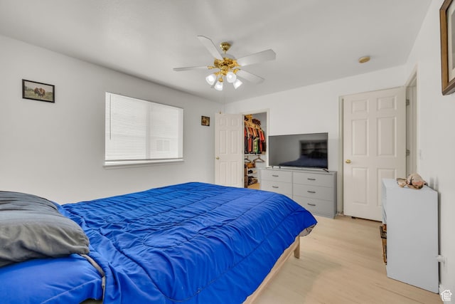 556 E 800 N, Ogden, UT 84404 - bedroom with light wood finished floors and a ceiling fan