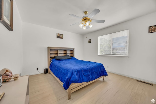 556 E 800 N, Ogden, UT 84404 - bedroom with wood finished floors, baseboards, and a ceiling fan
