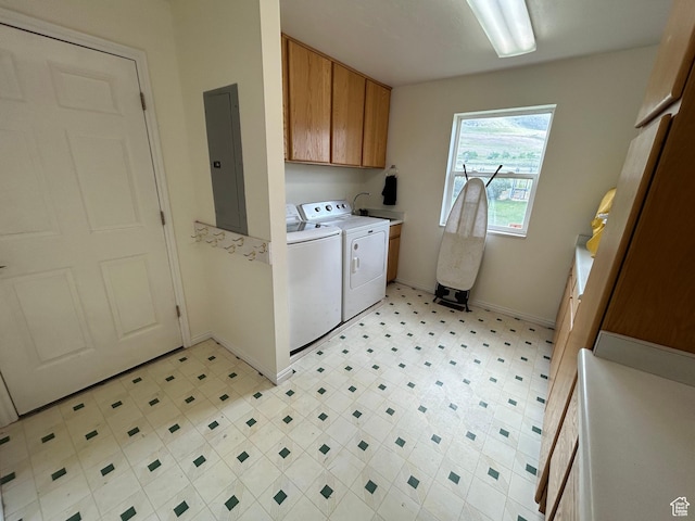4306 Elk Ln, Erda, UT 84074 - laundry area with electric panel, cabinet space, independent washer and dryer, baseboards, and light flooring