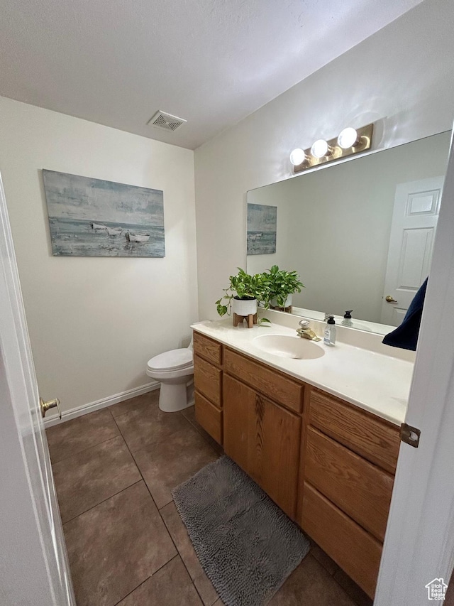 4306 Elk Ln, Erda, UT 84074 - bathroom with vanity, toilet, tile patterned flooring, and baseboards