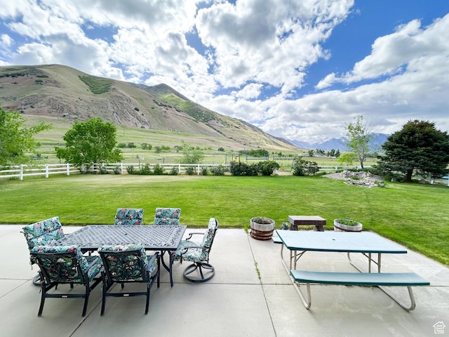 4306 Elk Ln, Erda, UT 84074 - view of patio featuring a mountain view and outdoor dining area