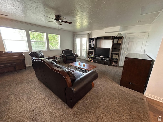 4306 Elk Ln, Erda, UT 84074 - living area with a ceiling fan, baseboards, a textured ceiling, crown molding, and carpet