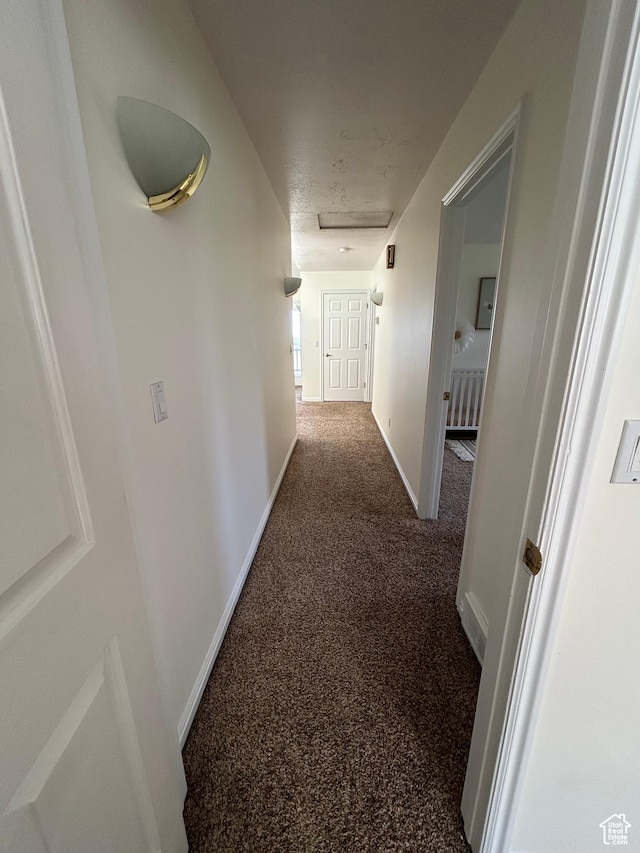 4306 Elk Ln, Erda, UT 84074 - hall with baseboards, attic access, and carpet