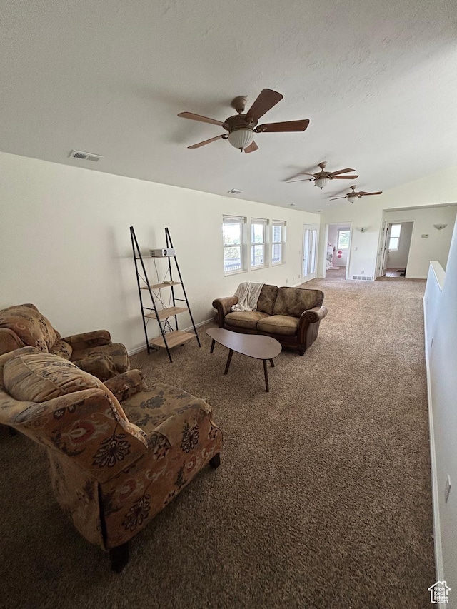 4306 Elk Ln, Erda, UT 84074 - living room featuring carpet floors, ceiling fan, and a textured ceiling