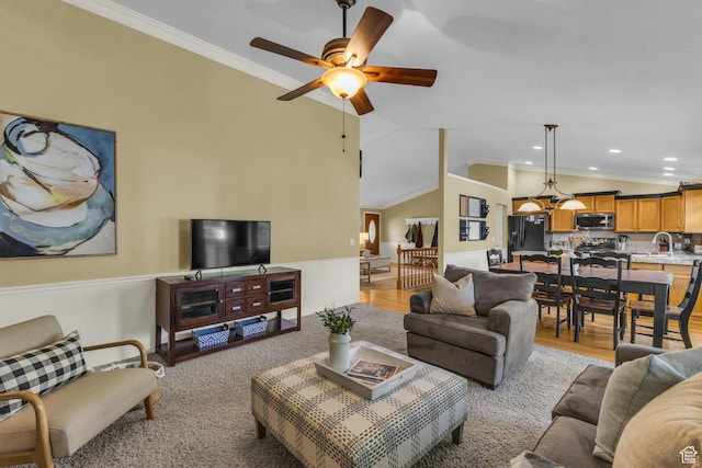2268 E 10140 S, Sandy, UT 84092 - living area with ornamental molding, vaulted ceiling, a ceiling fan, baseboards, and recessed lighting