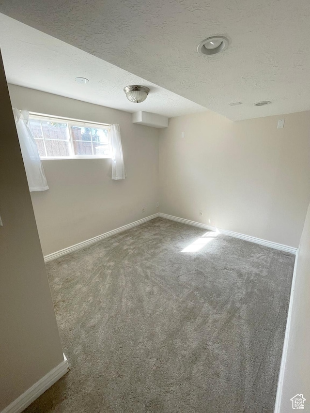 975 S Canyon Breeze E, Draper, UT 84020 - unfurnished room featuring baseboards, carpet floors, and a textured ceiling