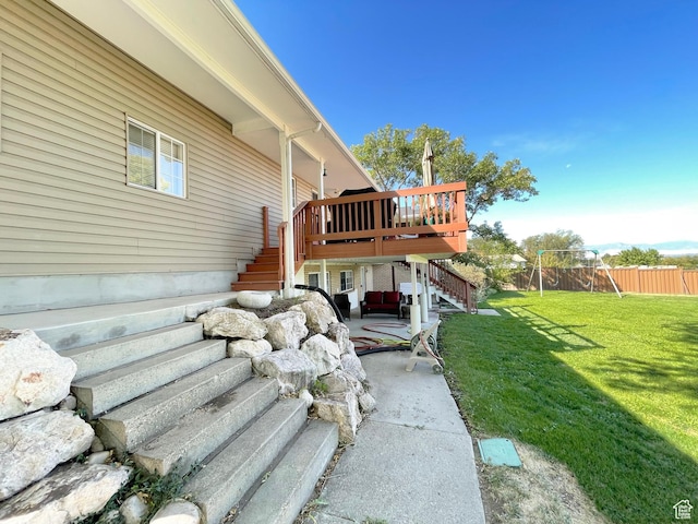 975 S Canyon Breeze E, Draper, UT 84020 - view of home's exterior with stairway, a patio, a deck, and a playground