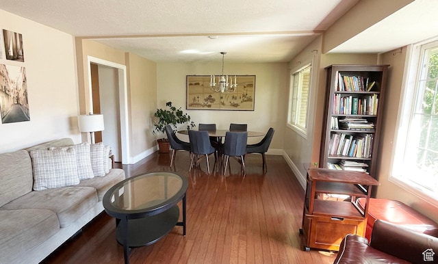 975 S Canyon Breeze E, Draper, UT 84020 - living room featuring hardwood / wood-style flooring, a chandelier, and baseboards