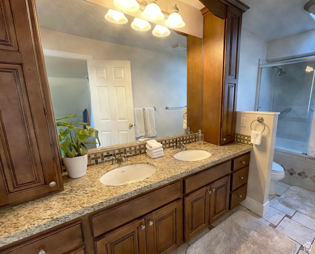 975 S Canyon Breeze E, Draper, UT 84020 - bathroom with double vanity, toilet,  shower combination, and a chandelier