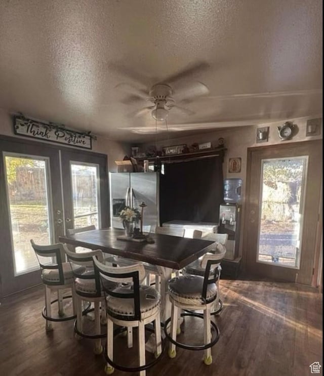 5293 N 6150 W, Roosevelt, UT 84066 - dining room with a textured ceiling, ceiling fan, and dark wood-style flooring