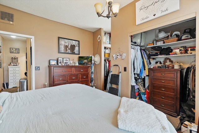 1183 S Hoytsville Rd Unit A, Hoytsville, UT 84017 - bedroom with a chandelier and a closet