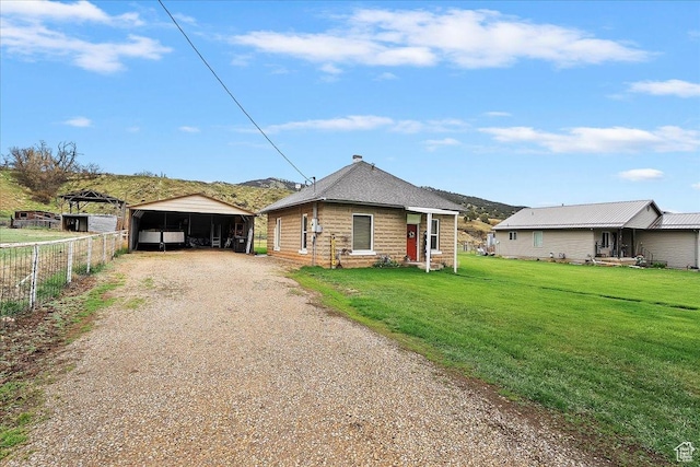 1183 S Hoytsville Rd Unit A, Hoytsville, UT 84017 - view of front of property with a carport, dirt driveway, and an outbuilding