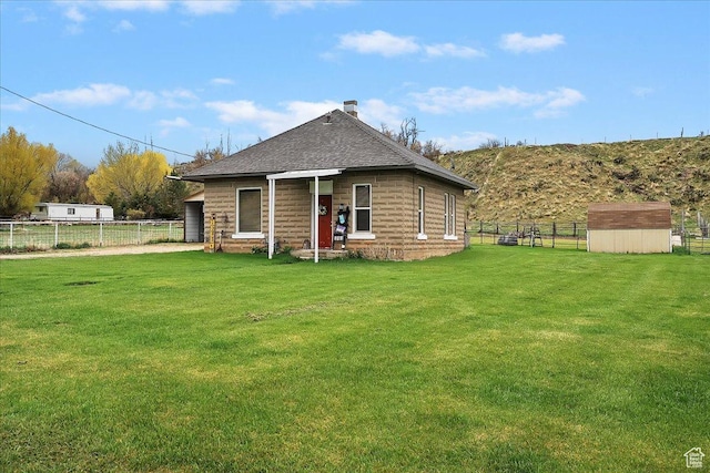 1183 S Hoytsville Rd Unit A, Hoytsville, UT 84017 - rear view of property featuring a chimney and roof with shingles
