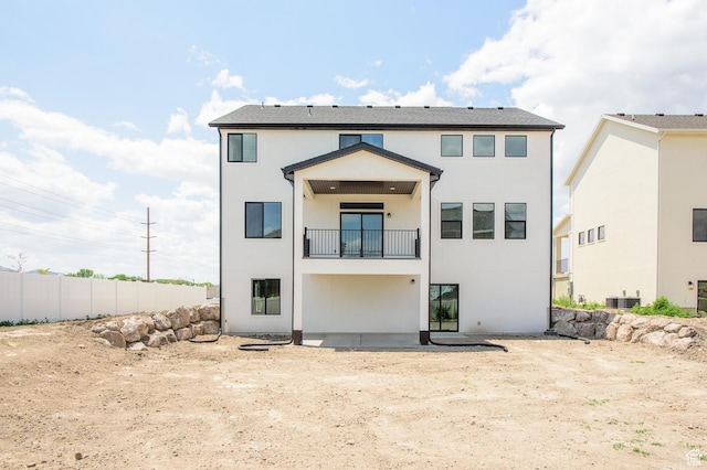 166 N Husker Ln, Saratoga Springs, UT 84045 - rear view of property featuring a balcony, stucco siding, and central air condition unit