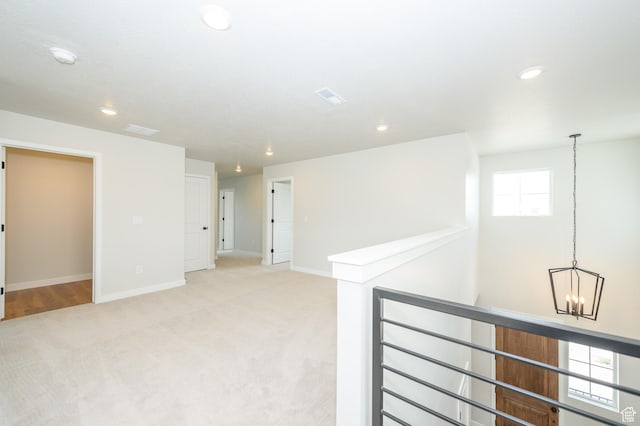 166 N Husker Ln, Saratoga Springs, UT 84045 - unfurnished room with light carpet, baseboards, recessed lighting, and a chandelier