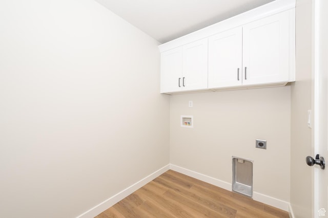 166 N Husker Ln, Saratoga Springs, UT 84045 - laundry room with hookup for an electric dryer, baseboards, cabinet space, and light wood-type flooring