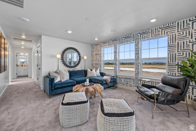 3164 N 3500 W, Plain City, UT 84404 - living area featuring carpet floors, healthy amount of natural light, baseboards, recessed lighting, and wallpapered walls