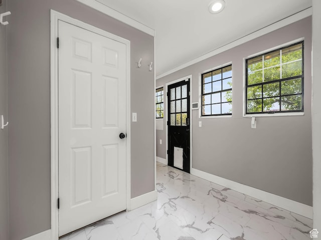 167 N 750 E, Orem, UT 84097 - entrance foyer with baseboards, light marble finish floors, recessed lighting, and ornamental molding